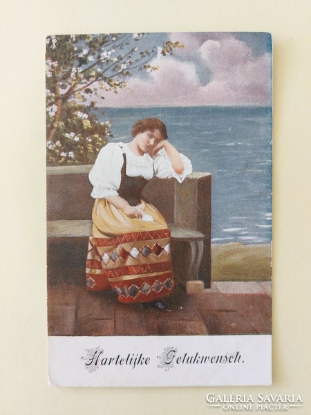 Old postcard lady on the beach