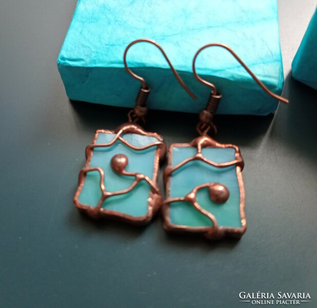 Unique handmade earrings made of light blue glass