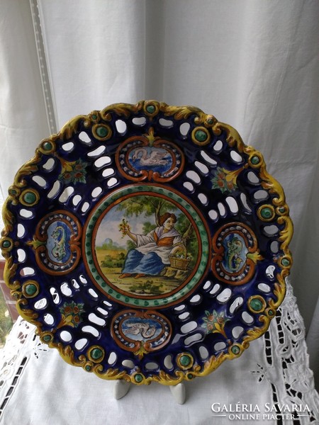 Hand-painted, pewter-glazed openwork cobalt blue antique majolica wall plate