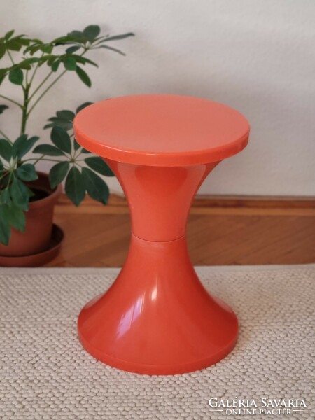 Retro orange plastic pillie chair