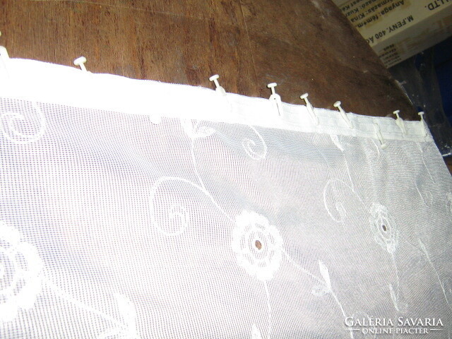 Beautiful fabric made of elegant curtains embroidered in Madeira