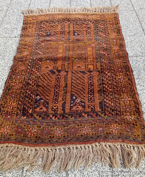 Afghan Baluch nomad hand-knotted antique rug is negotiable