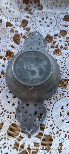 Pewter - probably - a small wine tasting bowl
