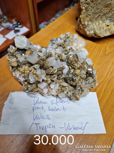 Quartz, sphalerite, pyrite, siderite, calcite deposits