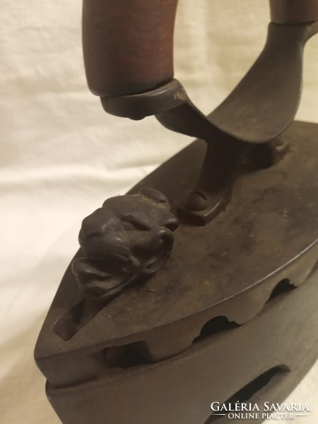 Iron with a lion's head