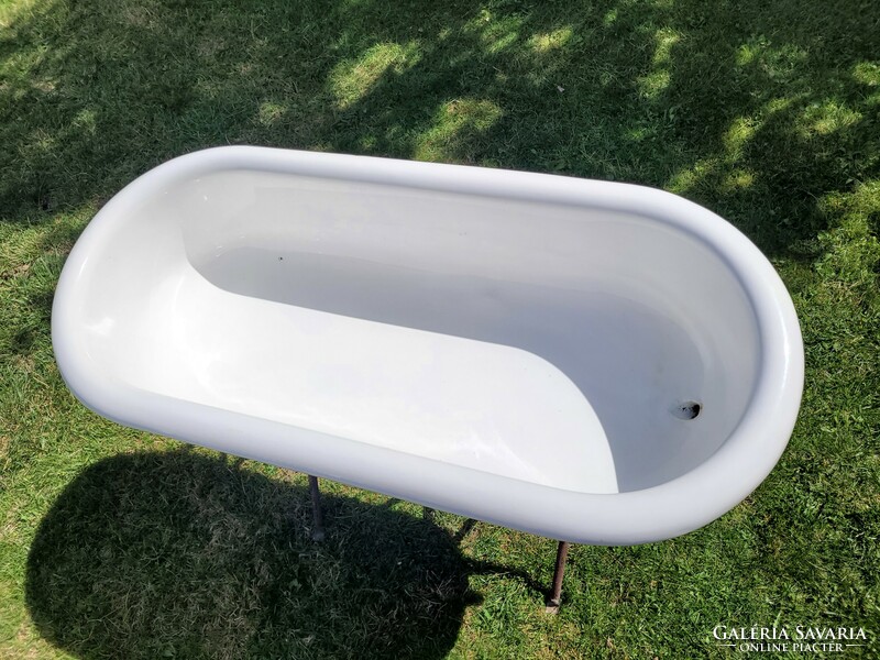 Old vintage enameled lampart in baby bath with enamel bathtub for kids tub with bathtub stand