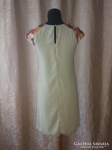 Mint green sequin lined midi dress. Size S, brand new. Chest: 44cm.