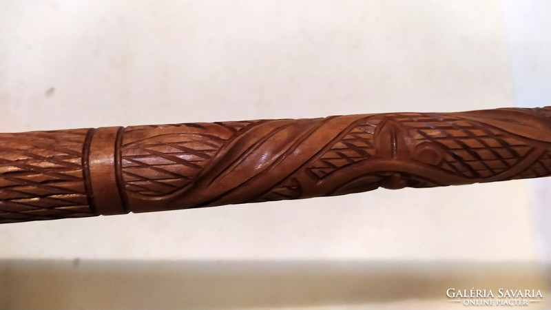 Antique, hand-carved, decorated walking stick