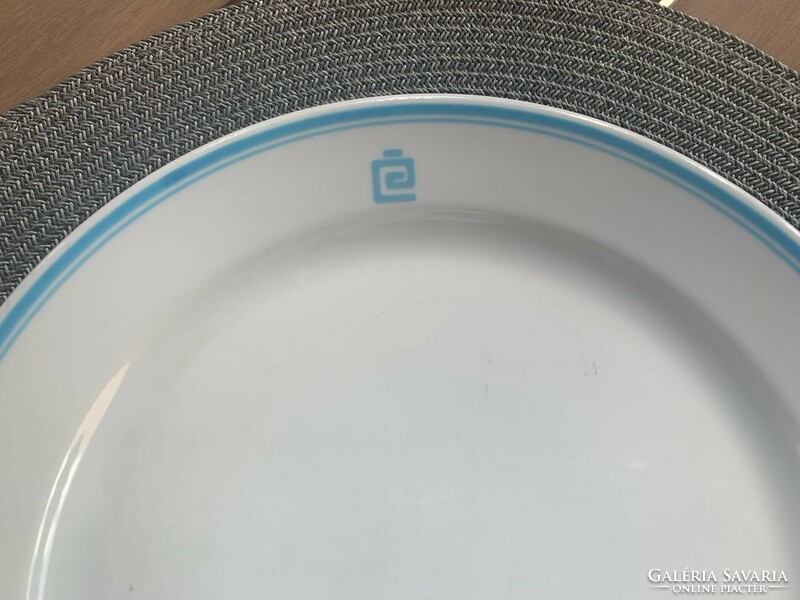 Porcelain plain plate with old company logo