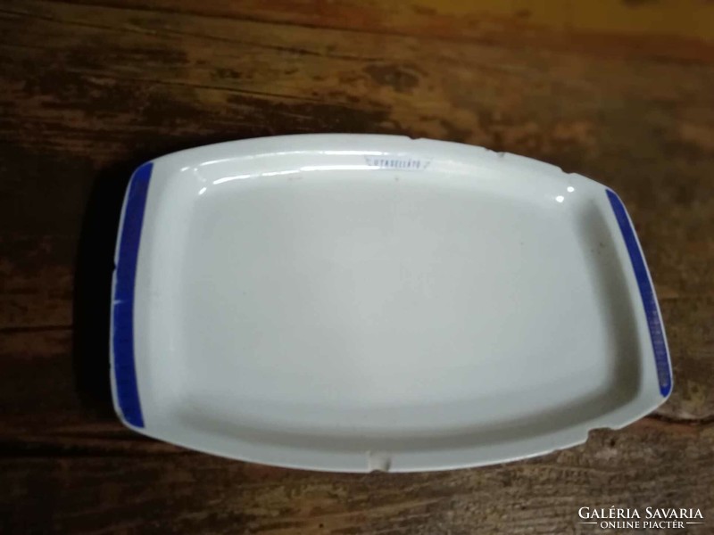 A large meat dish used by a passenger catering company, baked porcelain, faulty piece