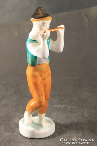 Rare porcelain flute player 634
