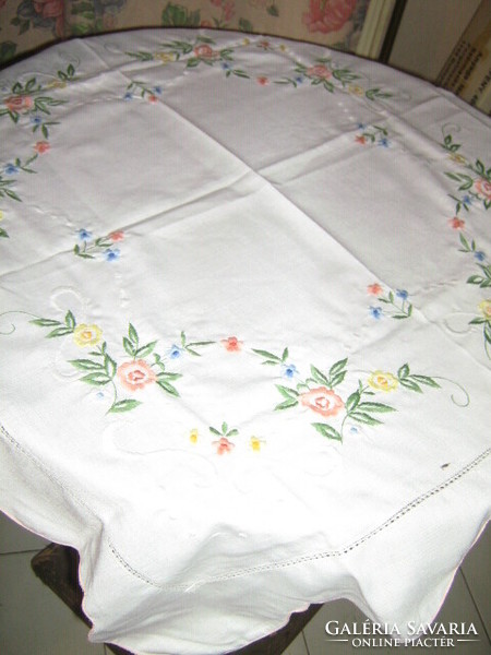 Beautiful vintage pastel colored embroidered floral tablecloth