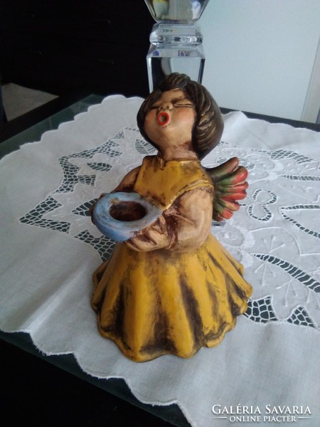 Thun ceramic angel in yellow dress with colorful angel wings, blue candle holder.