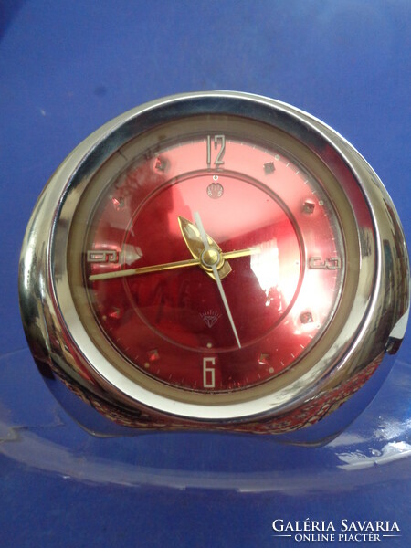 Design retro alarm clock showing seconds