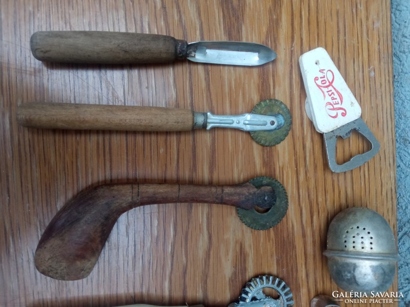 Old retro kitchen equipment - derelye cutter - bottle opener coca cola