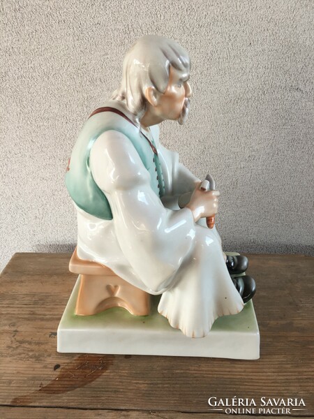 Zsolnay bacon-eating shepherd porcelain figure.