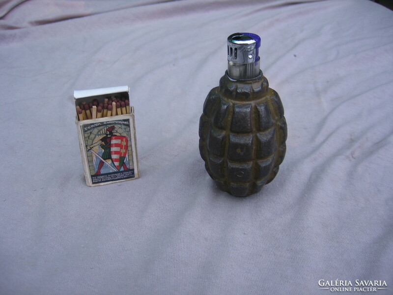 Old military souvenir. Hand grenade lighter.
