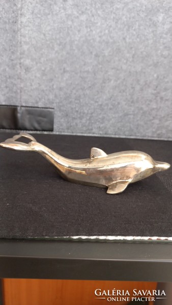 Vintage metal bottle opener in the shape of a dolphin with a screw cap in the belly, opener with chrome coating, 17 cm.