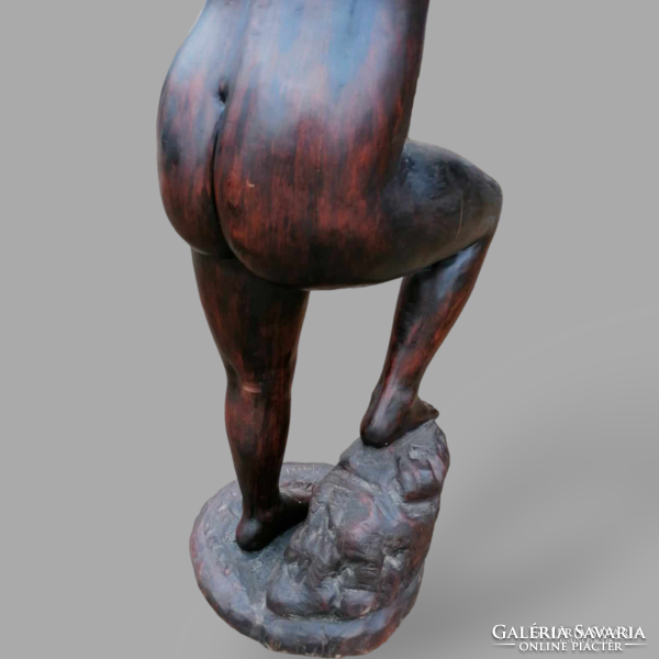 Signed female nude statue made of wood