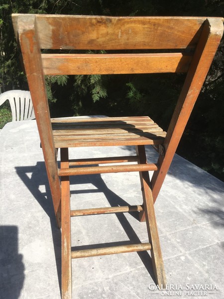 Old folding wooden children's chair