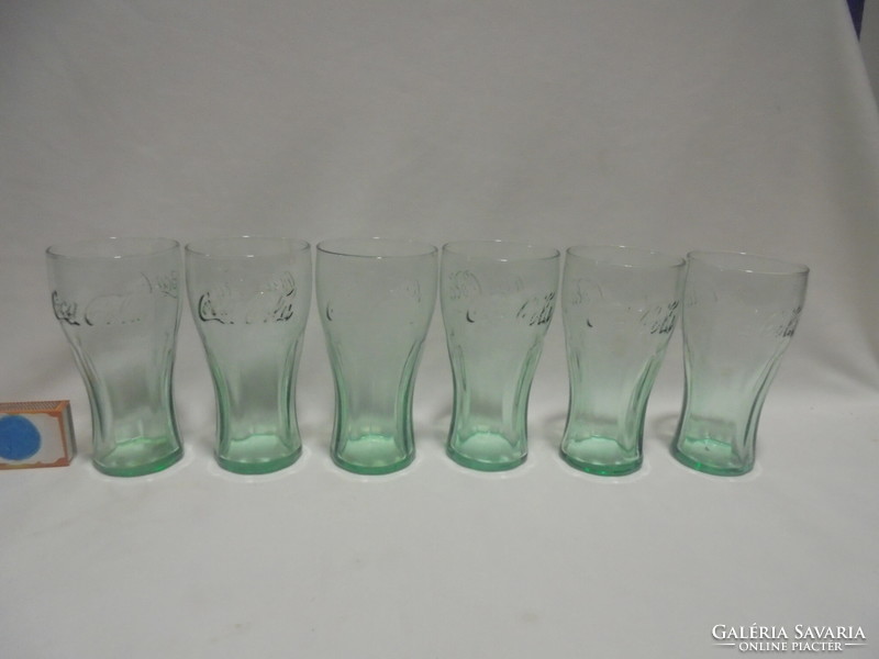 Six pale green Coca-Cola glasses - together