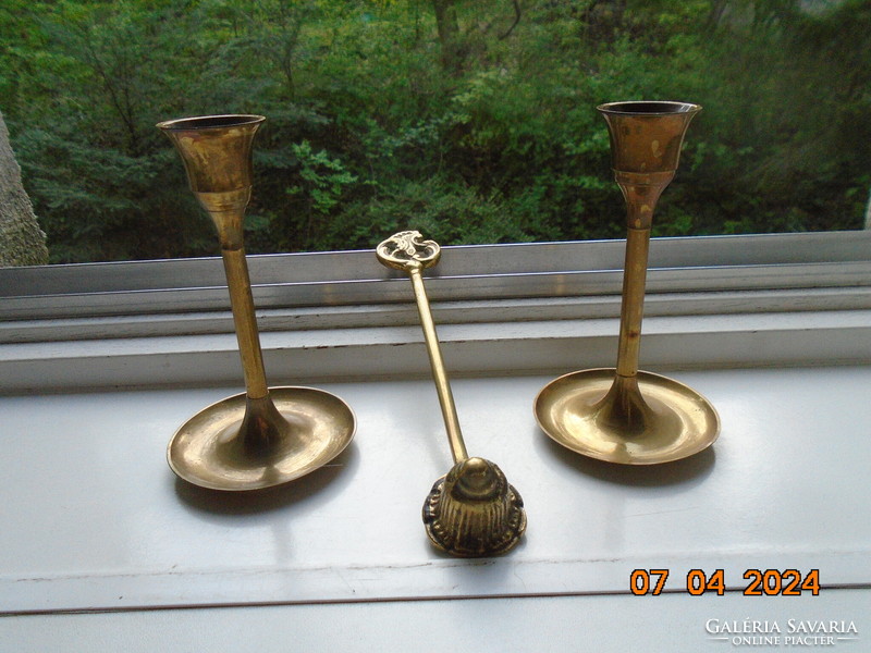 2 copper tulip candle holders with a decorative bronze knob and a wide base