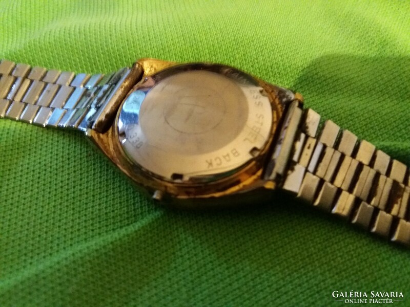 An old roemer automatic watch needs to be repaired according to the pictures