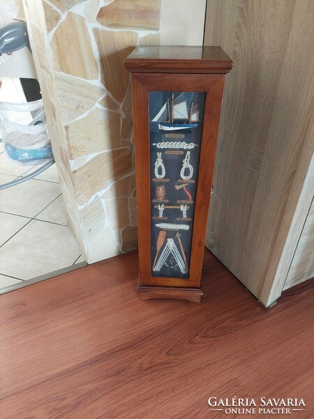 Art deco small cabinet for storing CDs or smaller objects.