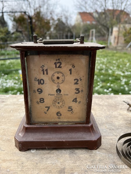 Travel clock with antique Junghaus structure