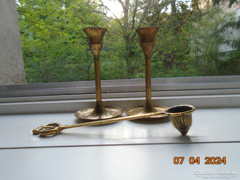 2 copper tulip candle holders with a decorative bronze knob and a wide base