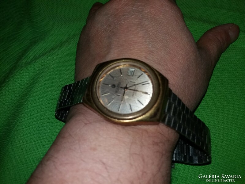 An old roemer automatic watch needs to be repaired according to the pictures