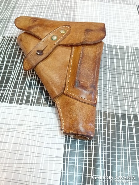 Leather holster with practice gun