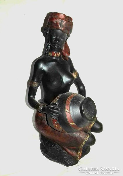 Drumming negro woman - probably a polyresin piece