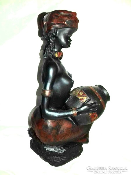 Drumming negro woman - probably a polyresin piece