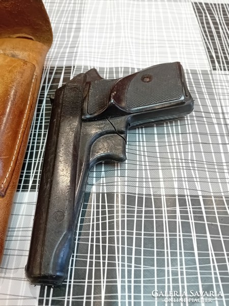 Leather holster with practice gun