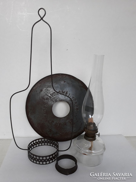 Antique hanging kerosene lamp from a farmhouse with lamp factory shade