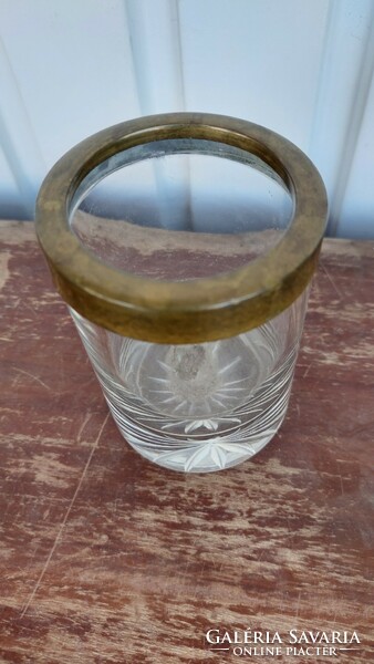 Old, copper-rimmed crystal container