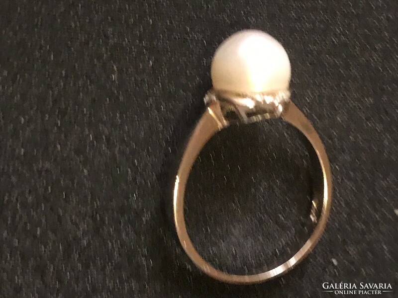 Új! Egyedi készítésű,nagyon szép tenyésztett gyöngggyel díszített 925 ,jelzett ezüst gyűrű. 55-ös