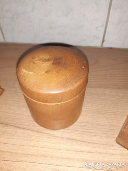 3 wooden boxes, a jar in one