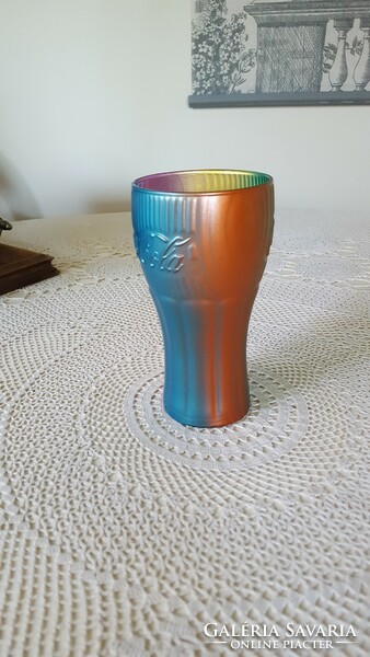 A special rainbow Coca-Cola glass