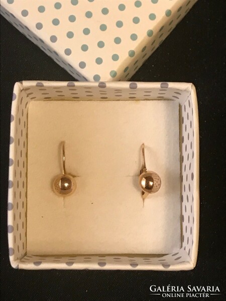 New! Baby earrings. Yellow gold lens marked 585. With baby lock. The diameter of the lens is 5 mm.