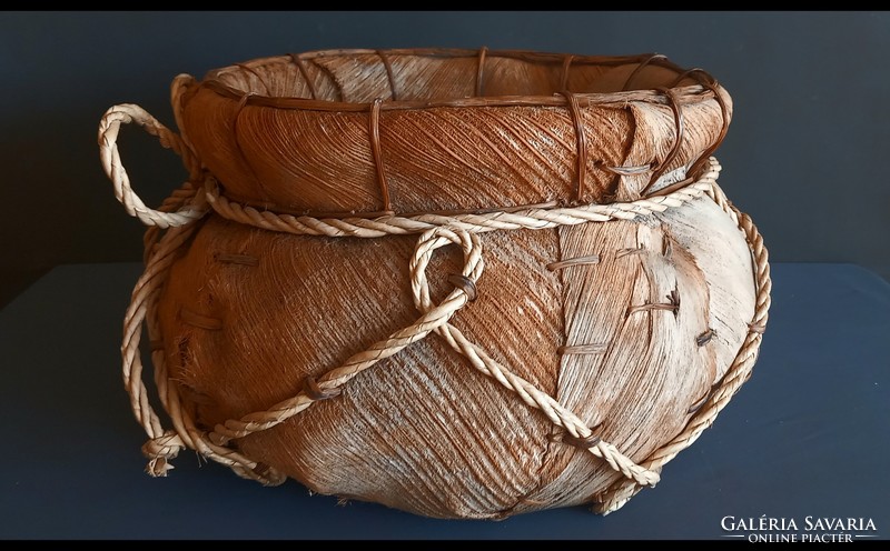 Huge palm leaf and rope holding basket negotiable design