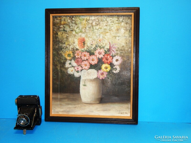 Frame with an external size of 47x37 cm, with a gift oil-on-canvas painting.