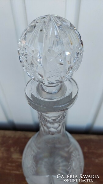 Polished, corked, crystal drinking glass