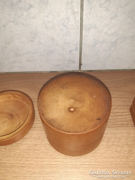 3 wooden boxes, a jar in one