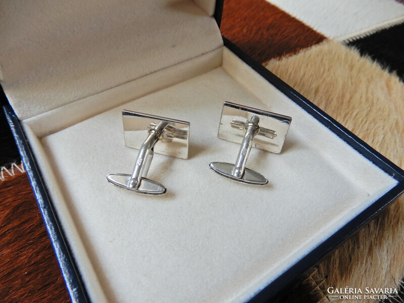 Pair of old silver cufflinks with gilded and engraved surfaces