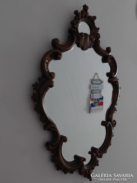 Antique carved faceted mirror