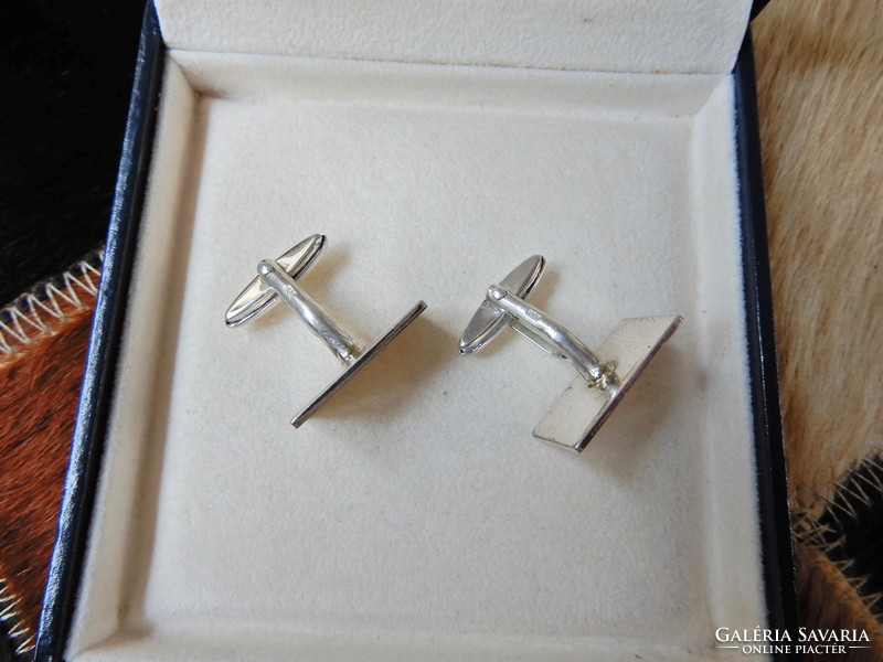 Pair of old silver cufflinks with gilded and engraved surfaces