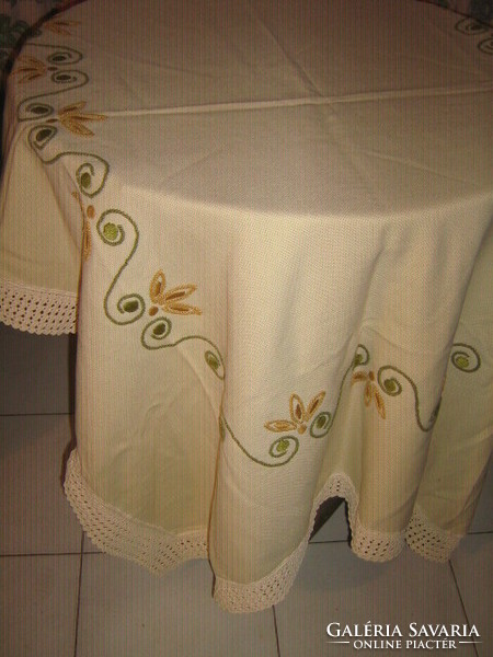 Beautiful buttery hand embroidered woven tablecloth with lacy edges