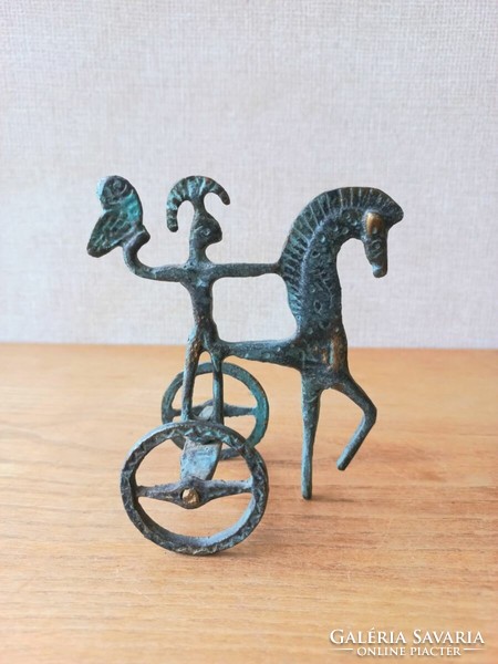 Retro metal work, goldsmith work. Etruscan horseman